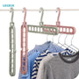 Smart Clothes Hanger Organizer – 9-Hole Space-Saving Magic Rack