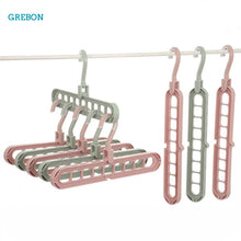 Smart Clothes Hanger Organizer – 9-Hole Space-Saving Magic Rack