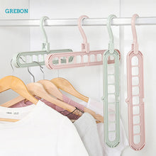 Smart Clothes Hanger Organizer – 9-Hole Space-Saving Magic Rack